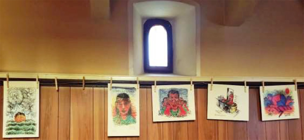 Pictures hanging along a wall