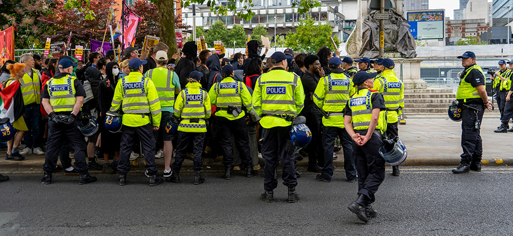 https://ctbiarchive.org/wp-content/uploads/2024/08/police-and-crowd-300x300-1.jpg